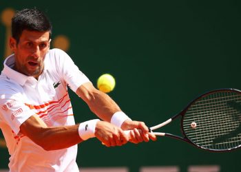 MONTE-CARLO, MONACO - APRIL 19: Novak Djokovic of Serbia plays a backhand against Daniil Medvedev of Russia in their quarter final match during day six of the Rolex Monte-Carlo Masters at Monte-Carlo Country Club on April 19, 2019 in Monte-Carlo, Monaco. (Photo by Clive Brunskill/Getty Images)
