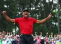 Apr 14, 2019; Augusta, GA, USA; Tiger Woods celebrates after making a putt on the 18th green to win The Masters golf tournament at Augusta National Golf Club. Mandatory Credit: Rob Schumacher-USA TODAY Sports