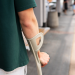 back shot of an injured man walking