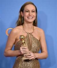 Brie Larson poses in the press room with the award for best actress in a motion picture - drama for Room at the 73rd annual Golden Globe Awards on Sunday, Jan. 10, 2016, at the Beverly Hilton Hotel in Beverly Hills, Calif. (Photo by Jordan Strauss/Invision/AP)