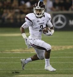 Fordham wide receiver Corey Caddle (2) runs the ball against Army during the first half of an NCAA college football game on Friday, Sept. 4, 2015, in West Point, N.Y. (AP Photo/Mike Groll)
