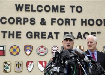 Eric Gay/AP, Lt. Gen. Mark Milley, the senior officer at Fort Hood, and Sen. John Cornyn (R-TX) address the media after the shootings. (Courtesy of Flickr)