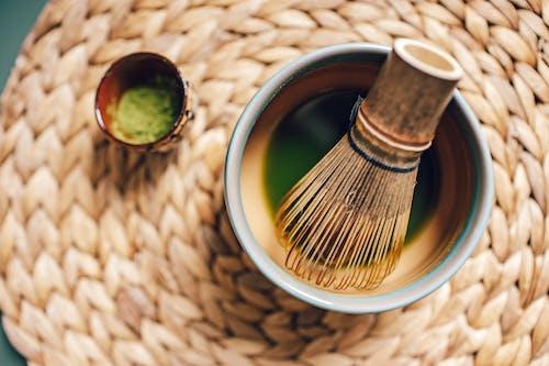 Free Bamboo Matcha Tea Whisk in Ceramic Bowl Stock Photo
