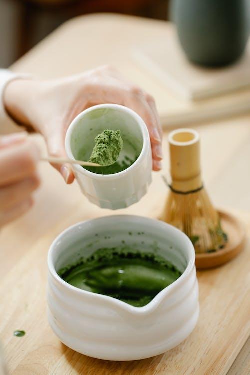 Free Woman Adding a Matcha Powder Stock Photo