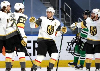 EDMONTON, ALBERTA - SEPTEMBER 10: Shea Theodore #27 of the Vegas Golden Knights celebrates with Mark Stone #61, Reilly Smith #19 and Jonathan Marchessault #81 of the Vegas Golden Knights as John Klingberg #3 of the Dallas Stars looks on after Theodore scored in the third period of Game Three of the Western Conference Final of the 2020 NHL Stanley Cup Playoffs between the Vegas Golden Knights and the Dallas Stars at Rogers Place on September 10, 2020 in Edmonton, Alberta. (Photo by Dave Sandford/NHLI via Getty Images)