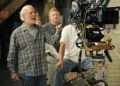 James Burrows, director of the television series "Partners," blocks out a scene for the show on Wednesday, Sept. 19, 2012, at Warner Bros. Studios in Burbank, Calif. Burrows isn't a household name. But behind the scenes Burrows reigns as a comedy giant. He's a director whose brand of funny business has helped shape TV comedy season after season. (Photo by Chris Pizzello/Invision/AP)
