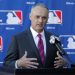 Commissioner-elect Rob Manfred speak with the media during a news conference at the Major League Baseball owners meeting, Thursday, Jan. 15, 2015, in Phoenix. Manfred succeeds Bud Selig when he retires later this month. (AP Photo/Rick Scuteri)