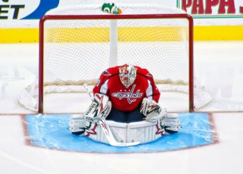 WASHINGTON, DC - October 9, 2010:  Washington Capitals goalie Michal Neuvirth (#30) prepares for the start of the second period of their NHL ice hockey game against the New Jersey Devils at Verizon Center.
