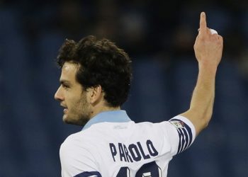 Lazio's Marco Parolo celebrates after scoring during a Serie A soccer match between Lazio and AC Milan in Rome's Olympic stadium, Saturday, Jan. 24, 2015. (AP Photo/Gregorio Borgia)